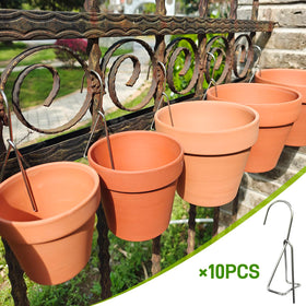KOROI wall-mount hanger on a fence enables easy, tool-free plant display.