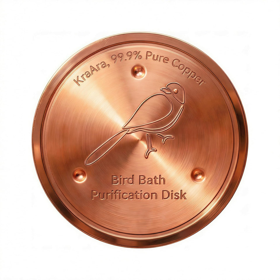 KraAra pure copper bird bath disk 4-inch resting in water to help reduce buildup