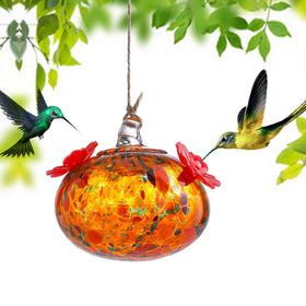 KRISININE glass hummingbird feeder showing two feeding ports with red flowers.