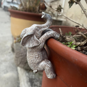 Kudriod elephant planter on balcony for patio decor.