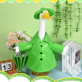Kuscul bright green garden goose stands out as a cheerful meadow decoration.