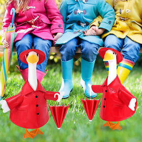 Garden party scene with Kuscul goose decor