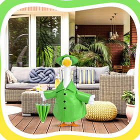 Kuscul summer garden decoration featuring a green raincoat goose in a sunny yard.