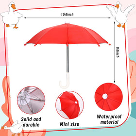Umbrella attached to goose hand with pins for secure outdoor wear