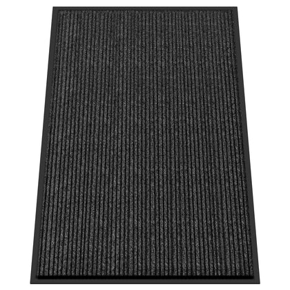 Kuyal front door mat 4x6 with non-slip backing traps dirt effectively.