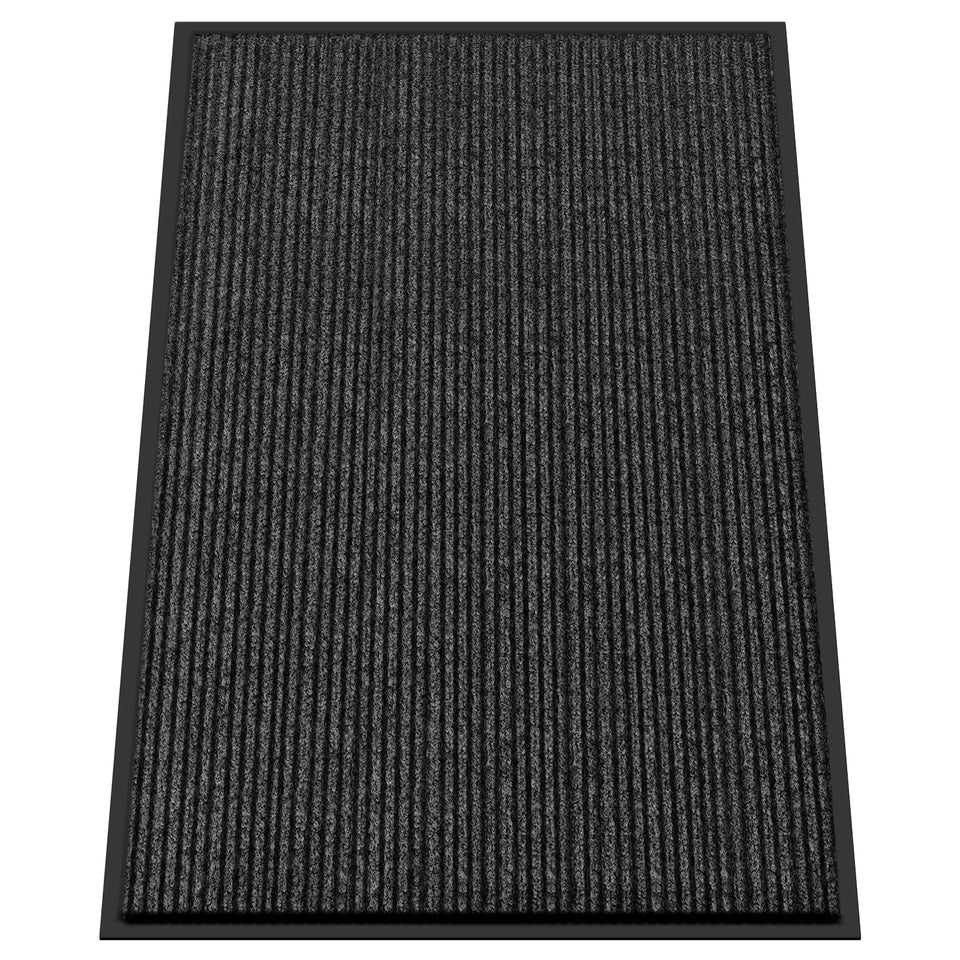 Kuyal front door mat 4x6 with non-slip backing traps dirt effectively.