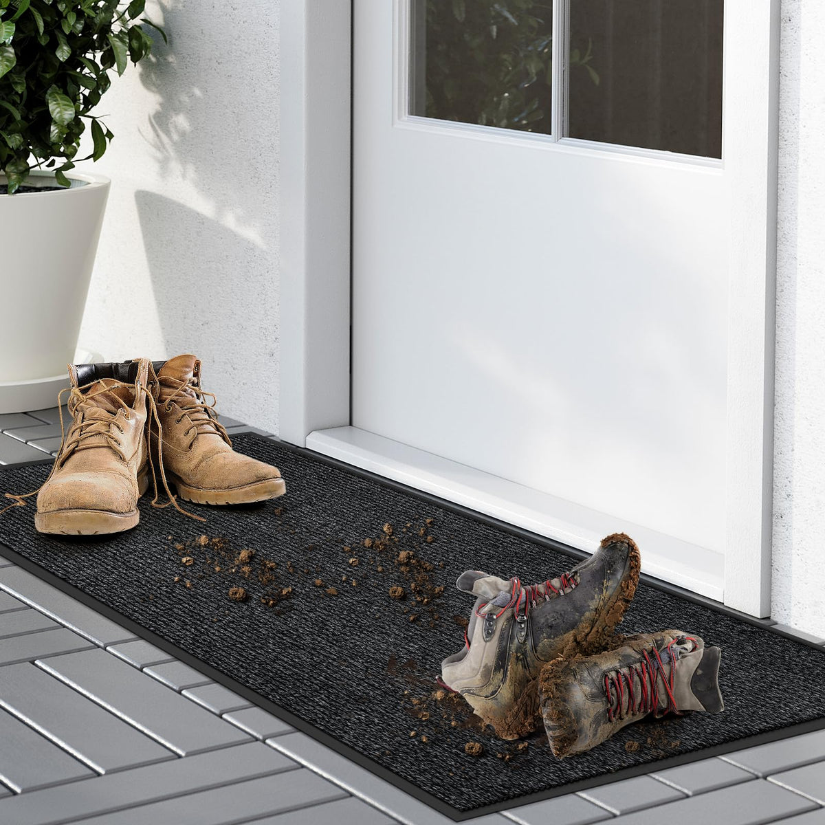 Kuyal front door mat with non-slip backing prevents slips at entryways.