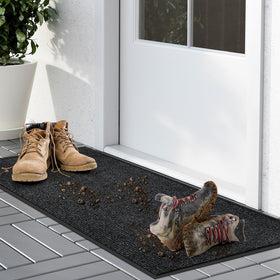 Kuyal front door mat with non-slip backing prevents slips at entryways.