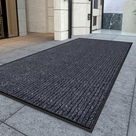 Kuyal heavy-duty entry mat non-slip backing for safe passage in high-traffic areas.