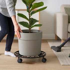 Freely position multiple planters while protecting floors and surfaces.