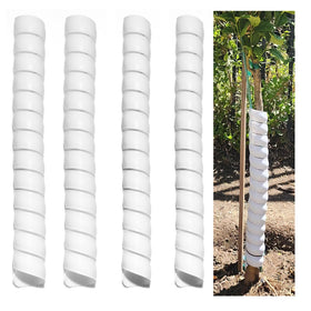 LA BARFUMERIE large spiral tree guard wrap protecting saplings from lawn damage.