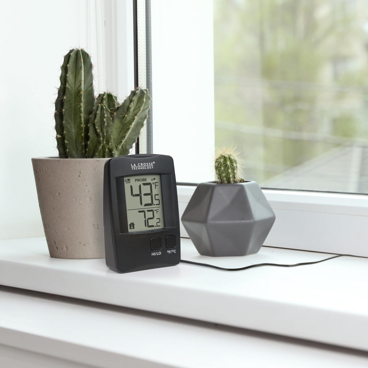 La Crosse 314-1410 thermometer monitors humidor temperature for cigar storage.