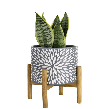 LA JOLIE MUSE ceramic planter with wood stand offers stylish indoor greenery.