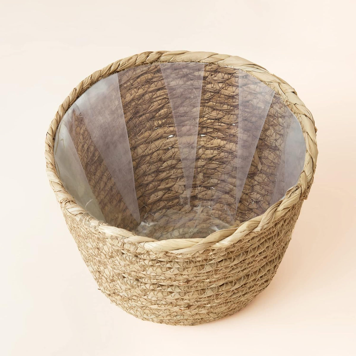 La Jolie Muse seagrass planter leak-proof interior for safe plant or storage use.