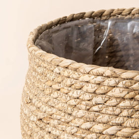 La Jolie Muse seagrass planter rustic texture blends with natural home decor.