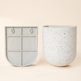 LA JOLIE MUSE set of two wall planters creates versatile display.