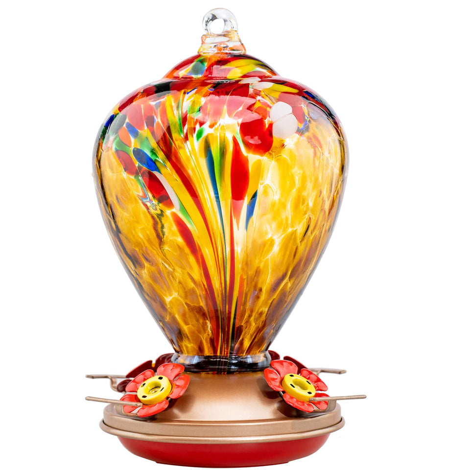 LaElvish Garden Hummingbird Feeder 34oz glass shines in sun, inviting birds to a lively backyard visit.