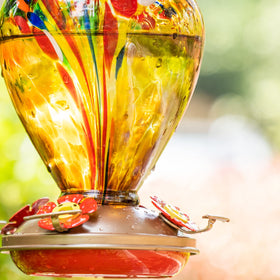 LaElvish Garden Upgraded Copper Feeder Ports ensure smooth nectar flow for visiting birds.