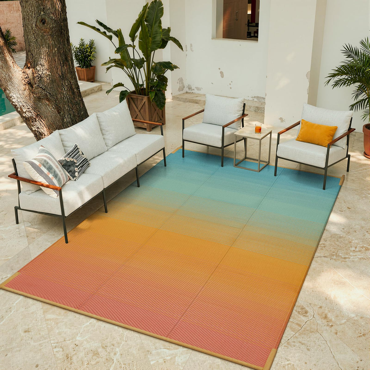 Lahome versatile rug for beach days and festivals, offering comfortable seating.