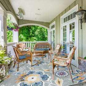 Lahome floral outdoor rug offers a soft underfoot feel outdoors.