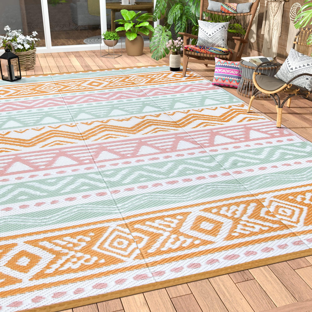 Lahome outdoor rug 6x9 in pink and orange, waterproof and easy to rinse.