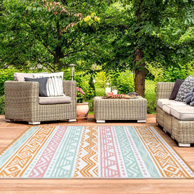 Kids and pets enjoy Lahome rug’s cushioned, waterproof outdoor space.