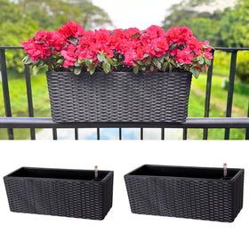 LáLáGreen outdoor rail planter in black with a rattan pattern for balcony growing.