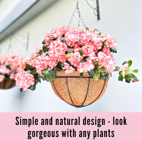 LáLáGreen wedding venue decor with natural rustic hanging planters.