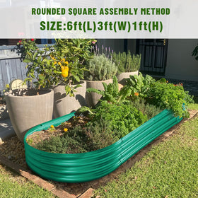 Land Guard Green Raised Bed in a garden setting shows versatile use