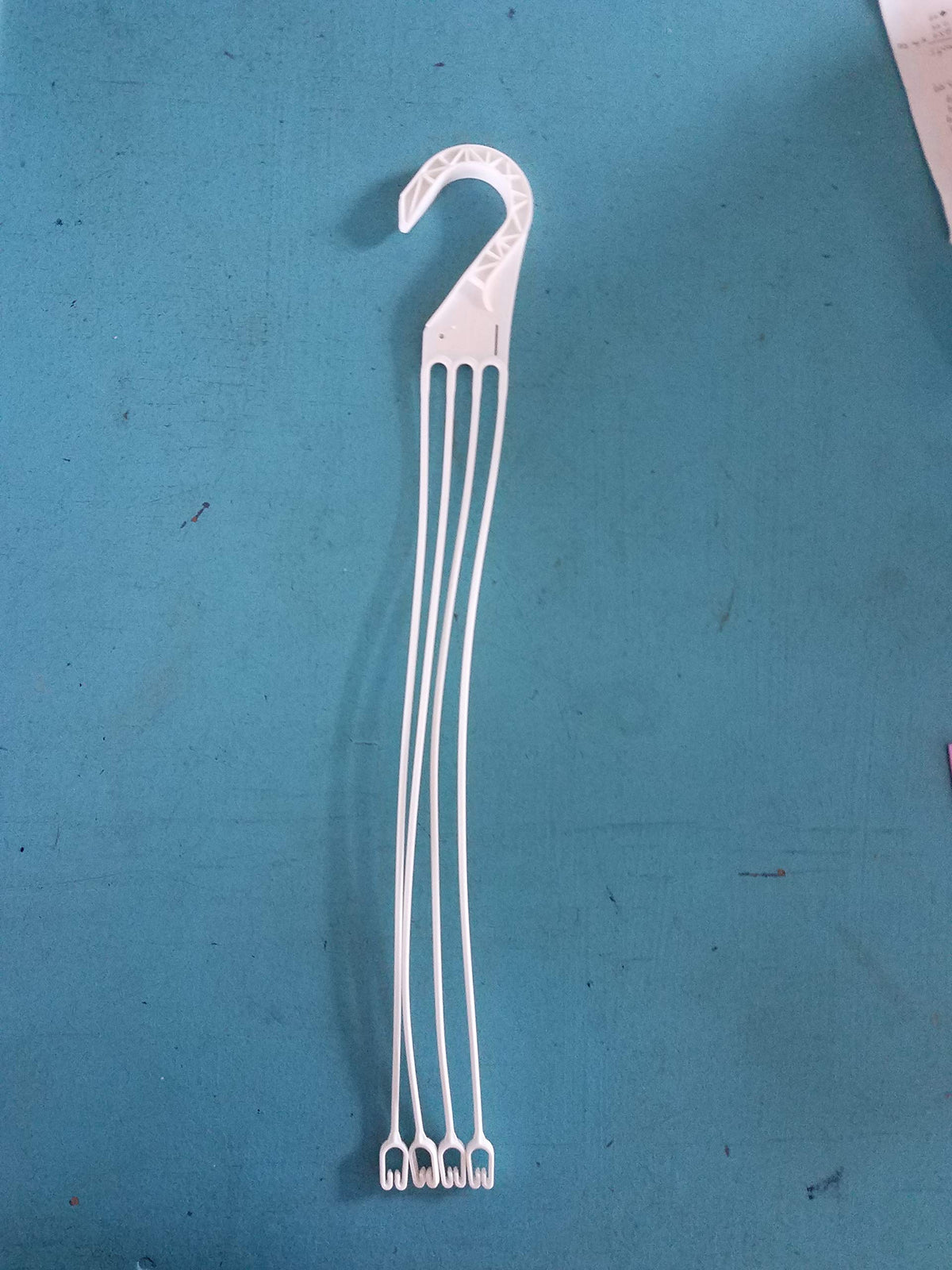 Landmark Plastics 22-inch hanger length for stable display.