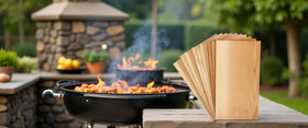 Langxinese cedar planks on the grill releasing rich aroma.