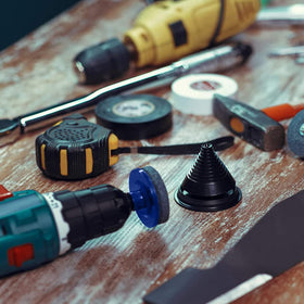 LAOJU compact 50x47 mm sharpener fits drills and tool storage neatly.