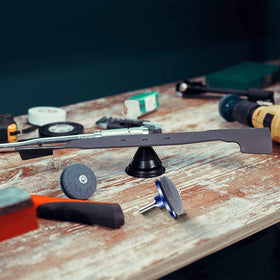 LAOJU easy install sharpener attaches to a drill and allows precise angle control.