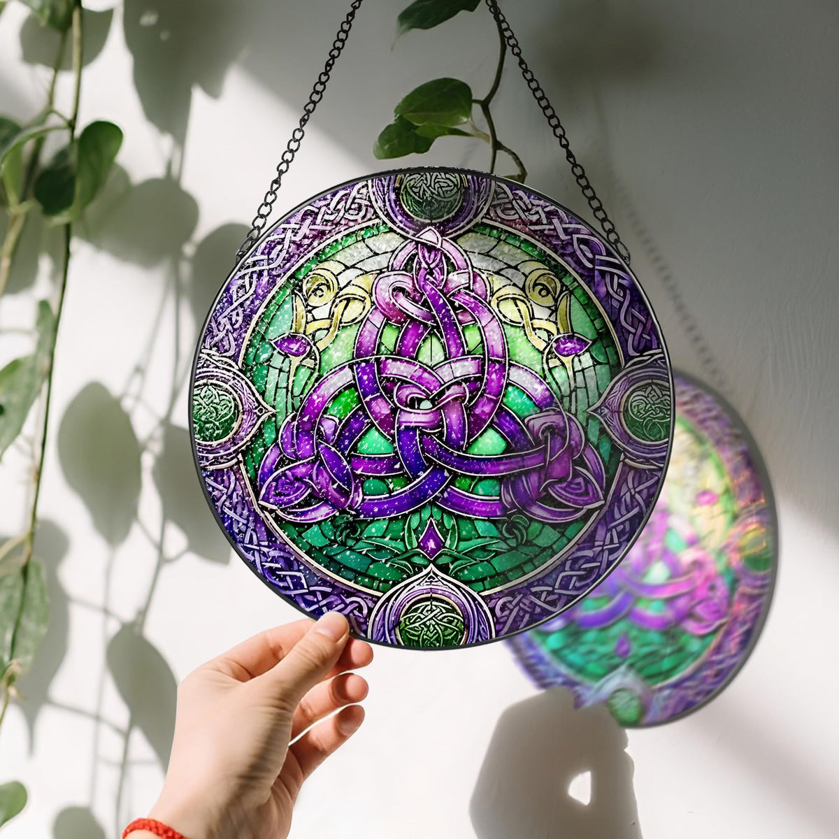 LAOWEIKI stained-glass ornament with black metal frame for durable display.