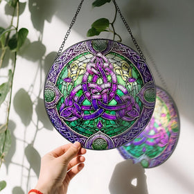 LAOWEIKI stained-glass ornament with black metal frame for durable display.