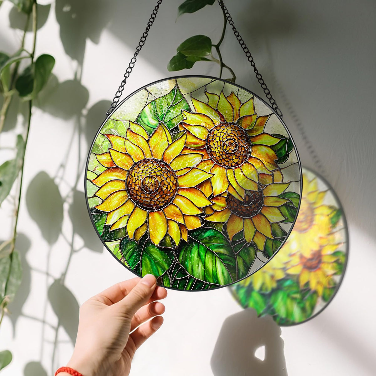 LAOWEIKI suncatcher with window suction hook for easy setup.