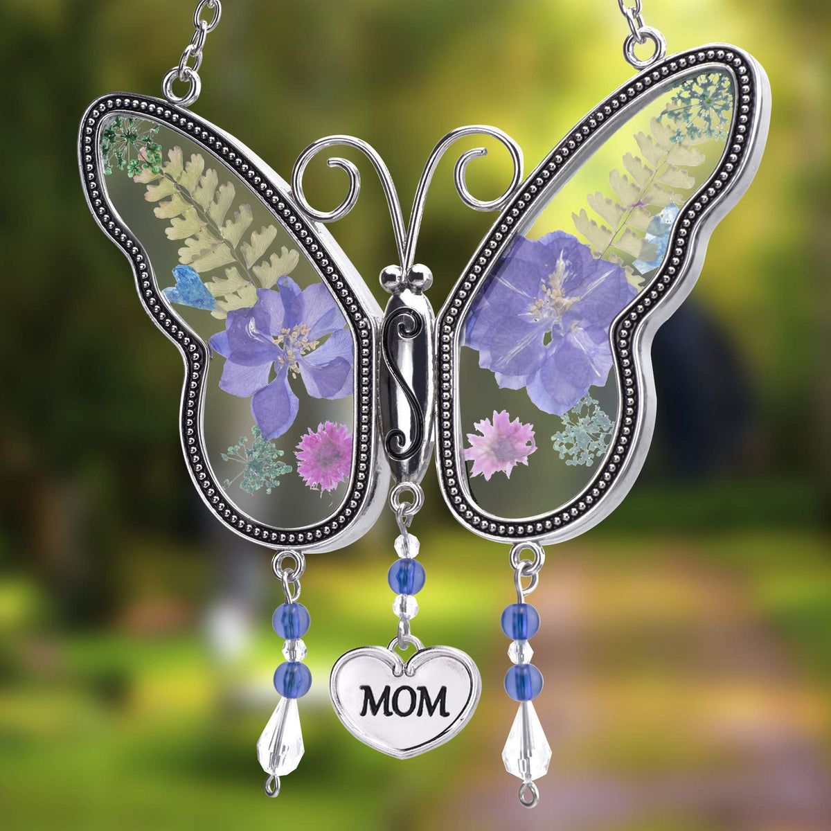 LARAINE butterfly wings glass with real flowers and crystals catching light beautifully