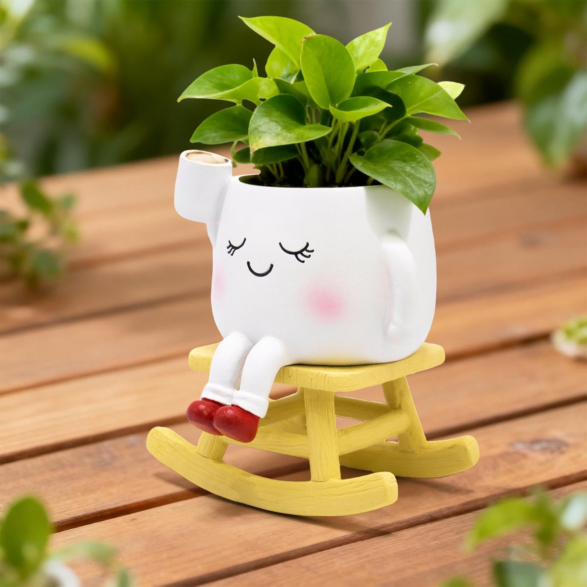 LAUGOKOBE Smiley Face detail planter featuring a book and coffee mug for cozy decor