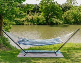 Lazy Daze packaging includes hammock, chains, and pillow for easy setup.