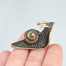 LCCCK brass snail garden ornament brightens outdoor or patio areas.
