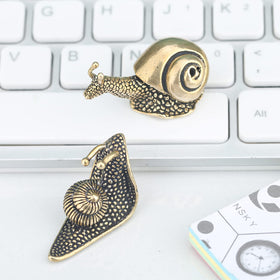 LCCCK brass snail terrarium decor brings nature-inspired charm.