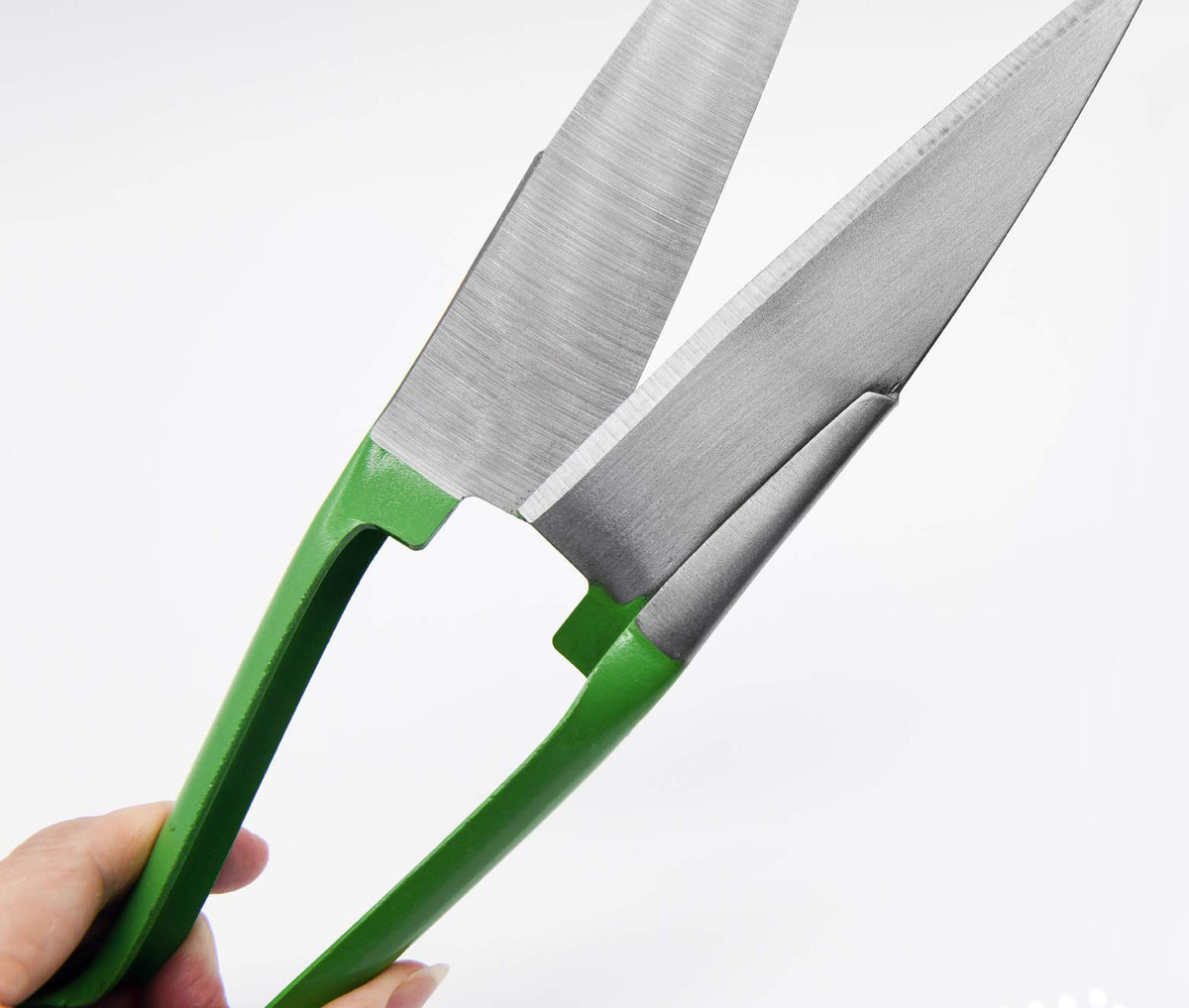 LCDCM Polished green handle providing comfortable, ergonomic grip.