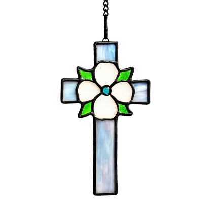 Lcensp stained glass cross suncatcher in a window enhances spiritual ambiance.