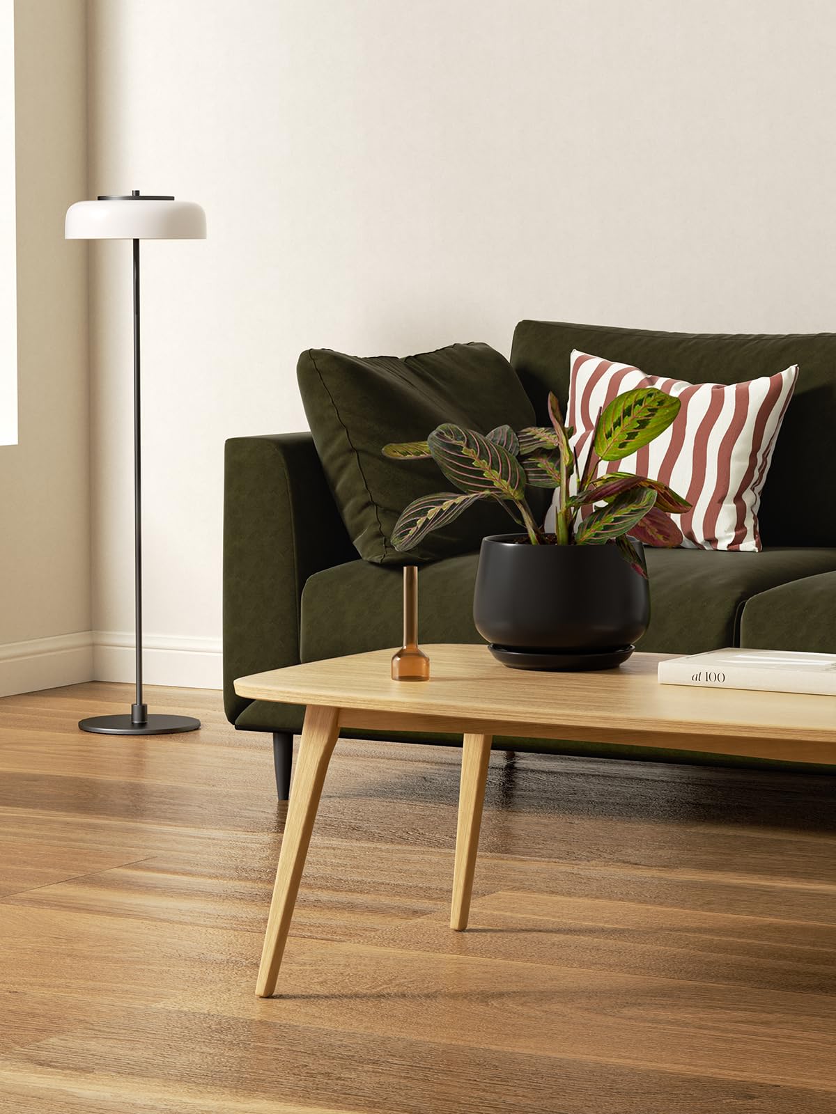 LE TAUCI ceramic planters with plants on a desk enhance indoor decor.