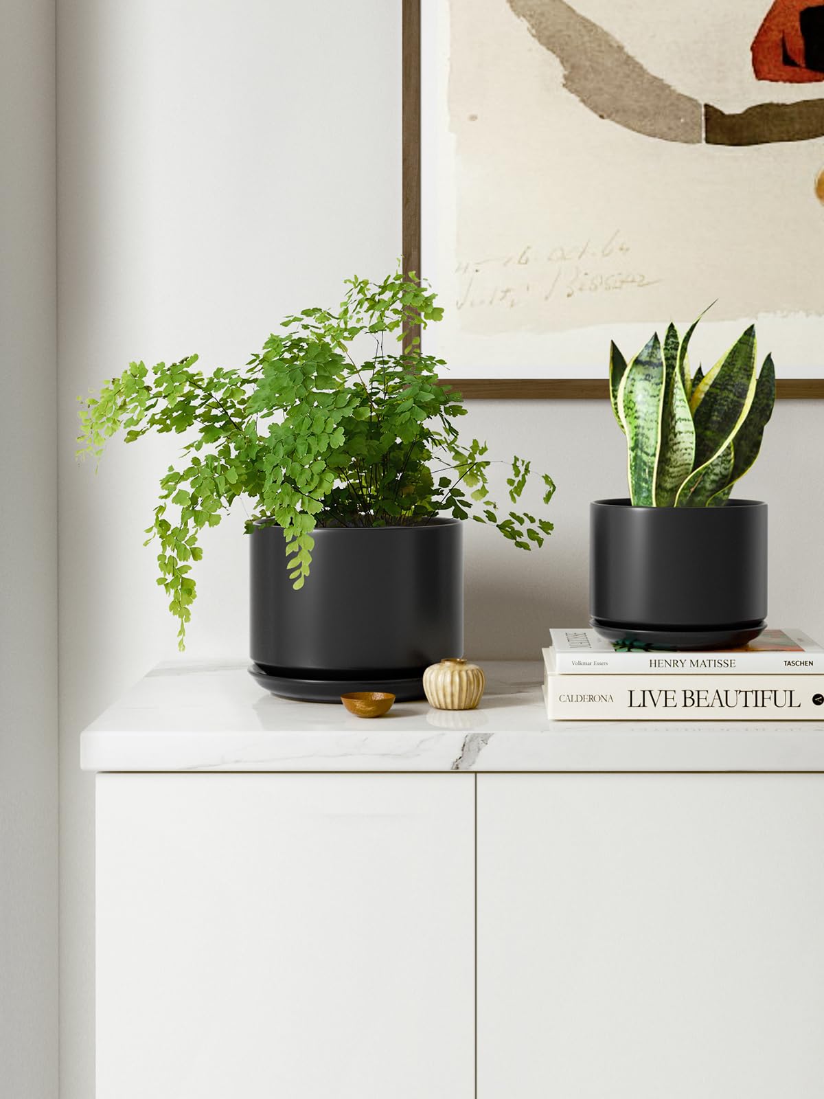 LE TAUCI ceramic pot 5.3-inch black with saucer for mid-sized plants.