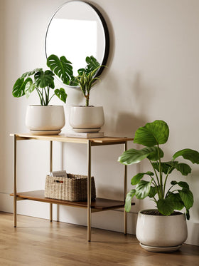 LE TAUCI home decor styling with pots in living spaces.