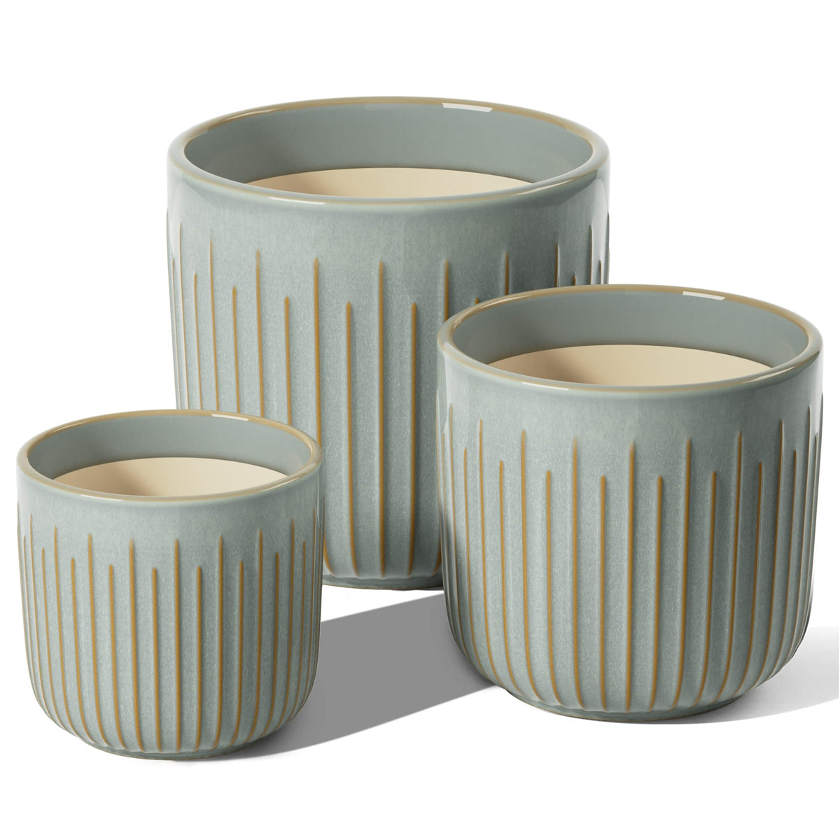 LE TAUCI mist gray glaze complements modern decor on shelves.