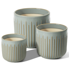 LE TAUCI mist gray glaze complements modern decor on shelves.