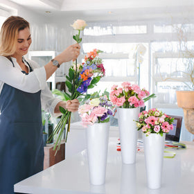 Indoor and outdoor-ready stand with layered bloom display options