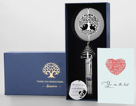 LEAVORES Thank You Wind Chimes with Tree of Life spinner in a garden setting